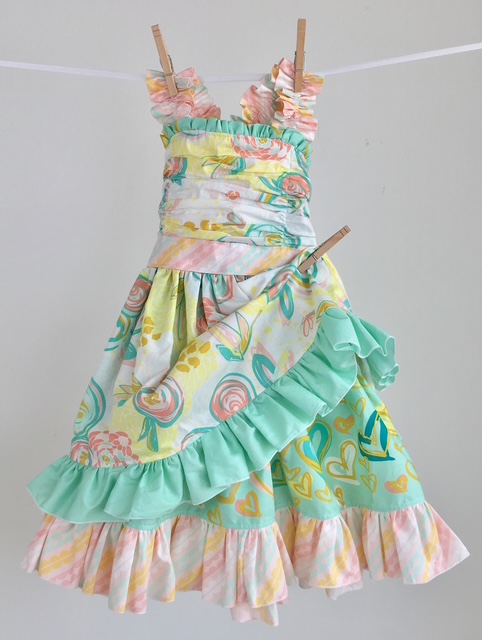 Mint and peach floral quilting cotton ruffle dress sewn from premium woven cotton yardage Mint and peach floral quilting cotton ruffle dress sewn from premium woven cotton yardage