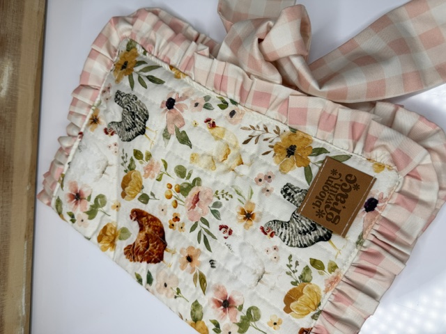 Full view of a handmade quilted Bible and journal cover with ruffle trim and matching tie โ Bible covers, journal covers, handmade unique gifts